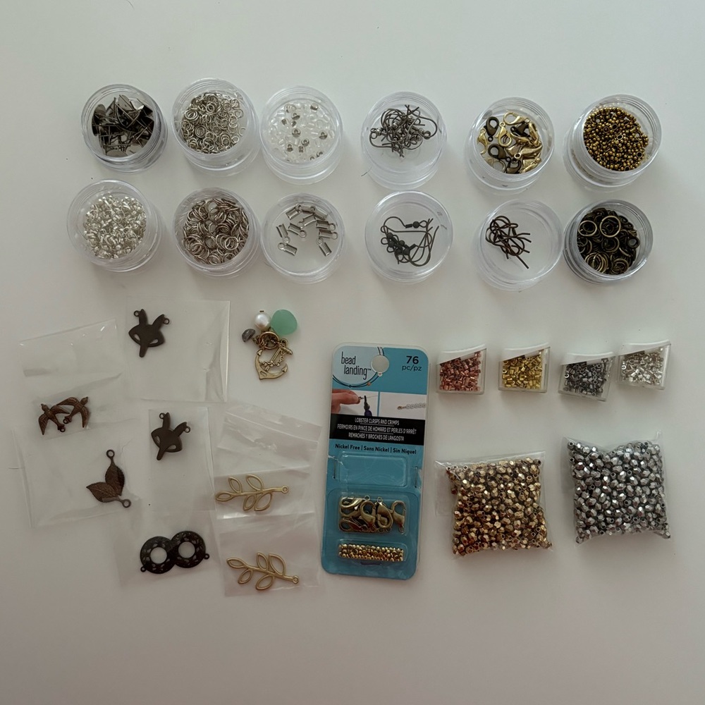 Various pendants and jewelry making supplies